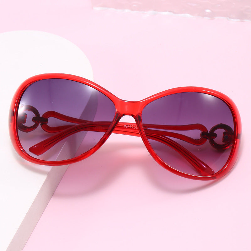 Damen Modische Sonnenbrille mit retro Akzenten Karnz