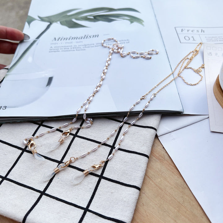 Elegante perlenverlinkte Brillen Kette Karnz 1786692183