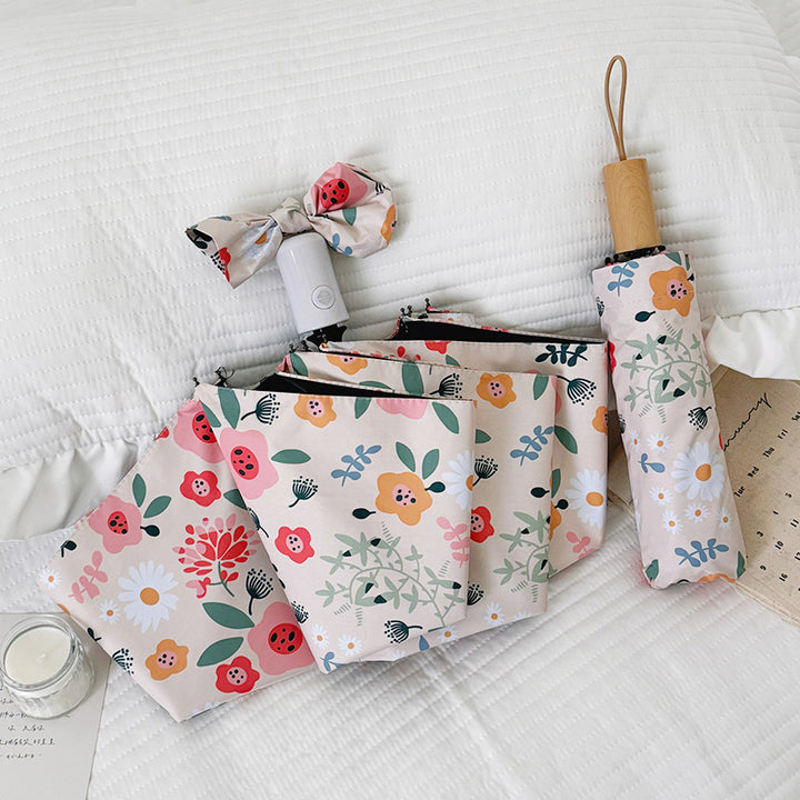 Damen Faltbarer Regenschirm mit floralem Design und niedlichen Details Karnz