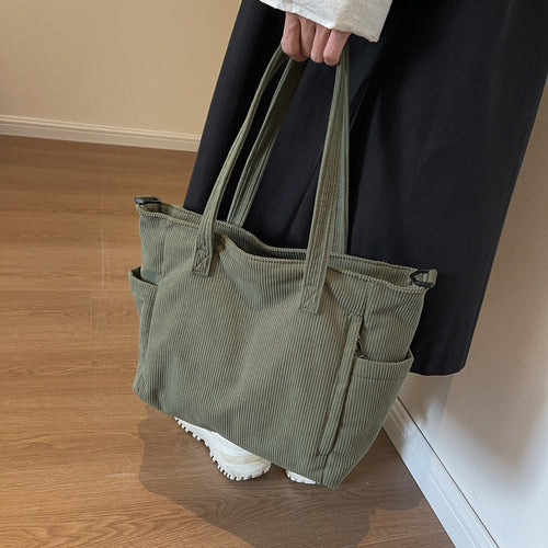 Texturiertes Multi-Taschen Reise Tote Karnz