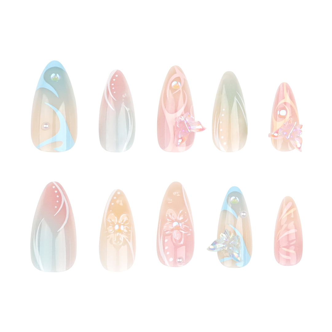 Kunstvolle Nagelverlängerungen mit 3D-Blumen und Glitzerakzenten Karnz