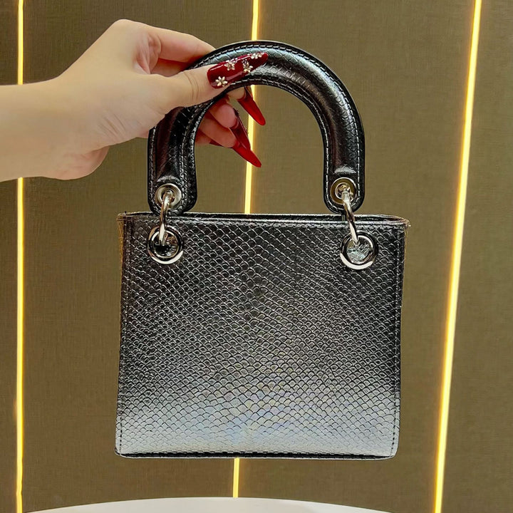 Stylische Schlangenleder-texturierte Handtasche