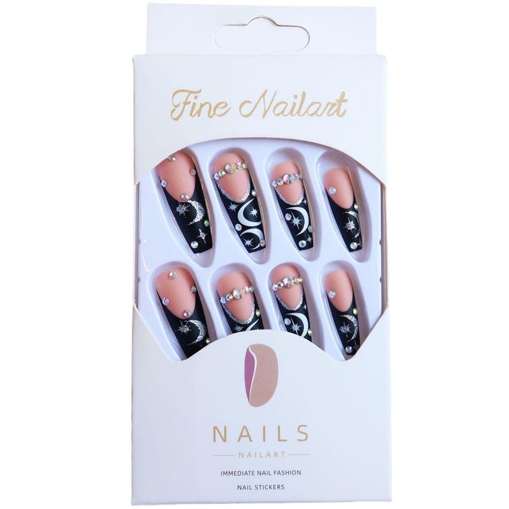 Künstlerisches langes Stiletto Press-On Nagelset mit Mond- und Sternmustern