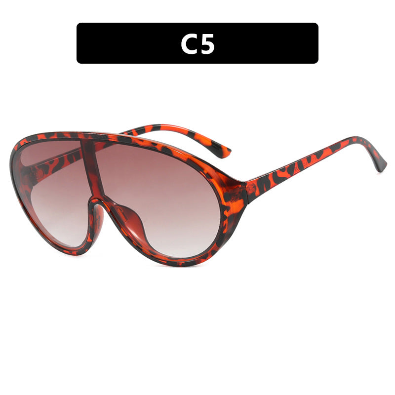 Damen futuristische Sonnenbrille mit großflächigen Gläsern und ergonomischem Rahmen Karnz