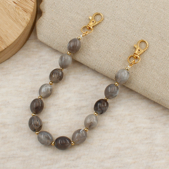 Elegante Perlen Brillenband Karnz