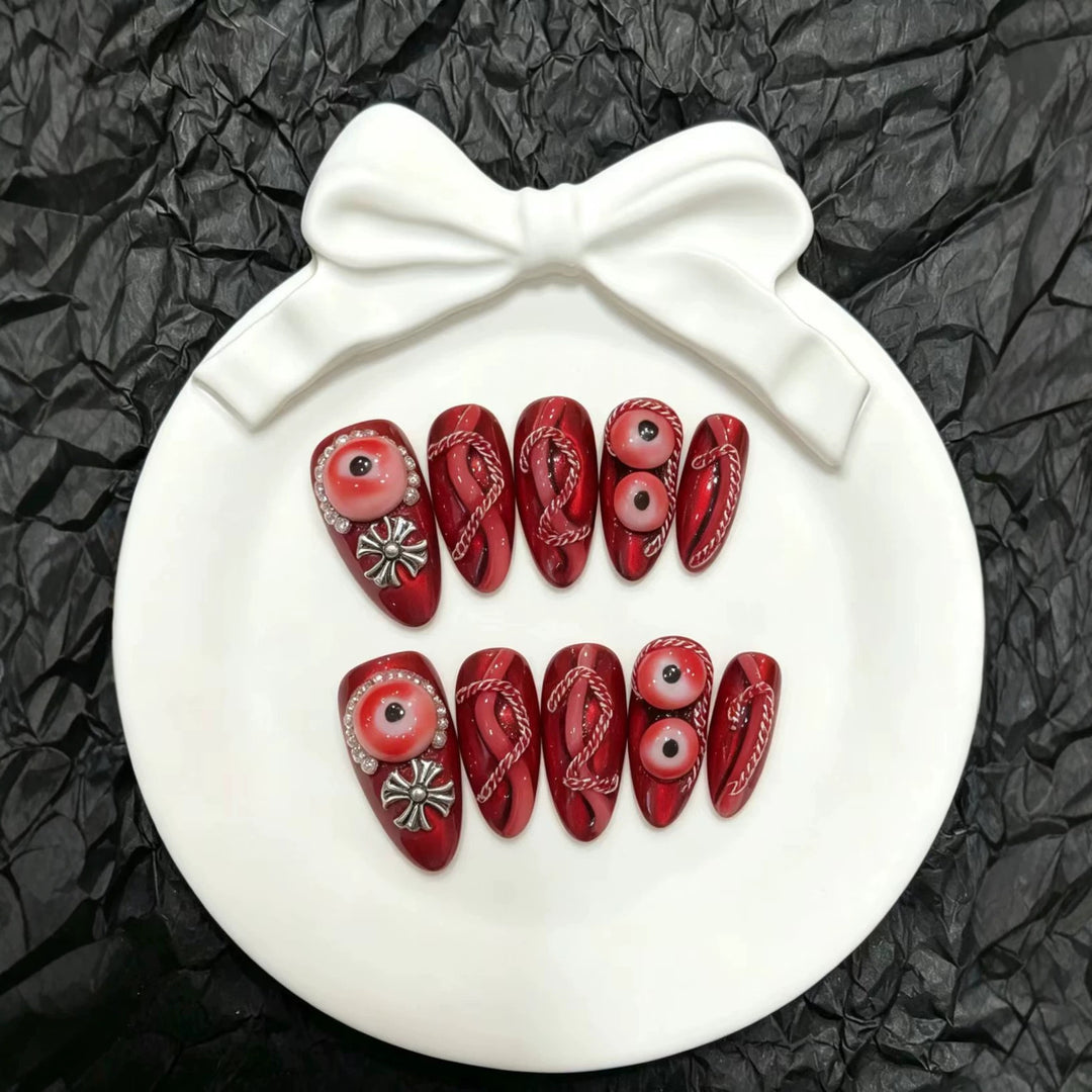 Künstlerisches Press-On Nagelkunst Set mit einzigartigen roten Designs