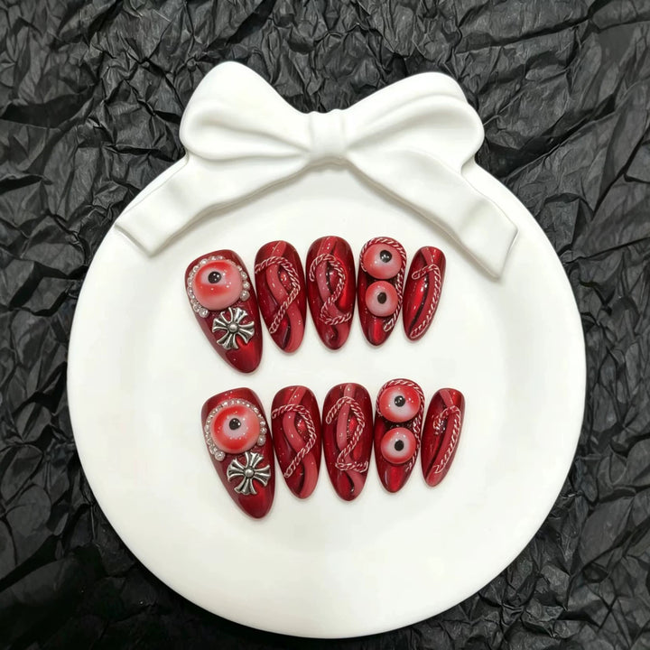 Künstlerisches Press-On Nagelkunst Set mit einzigartigen roten Designs