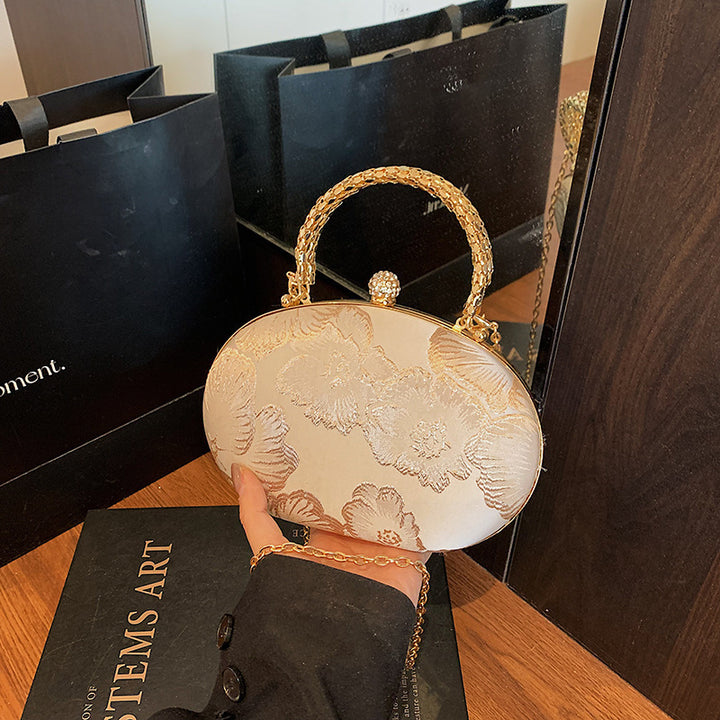 Elegante Blumen Abendtasche Karnz