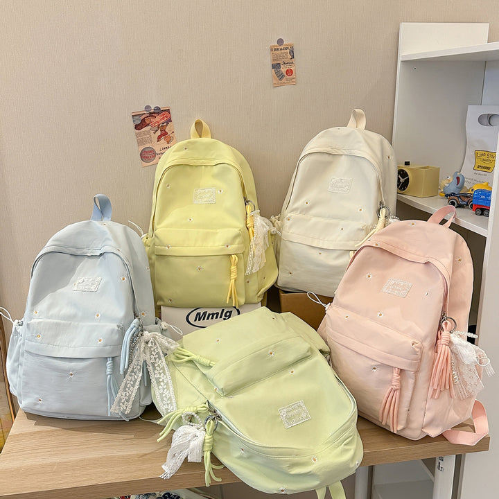 Stylischer backpack mit floralem Schmuck Karnz