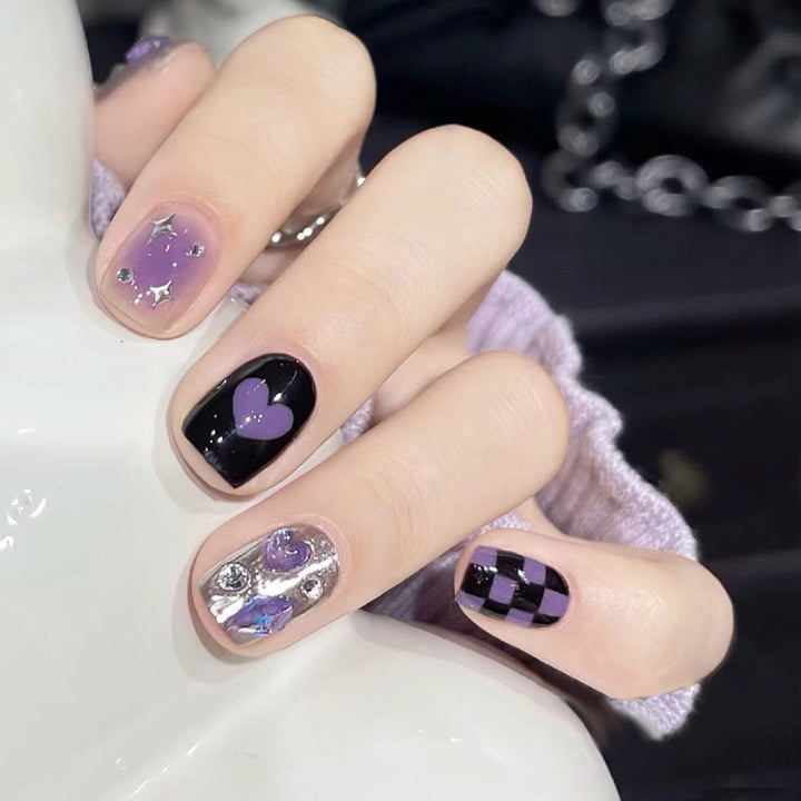 Künstlerisches Press-On Nail Set mit Herz- und Stern-Designs Karnz 1789389240