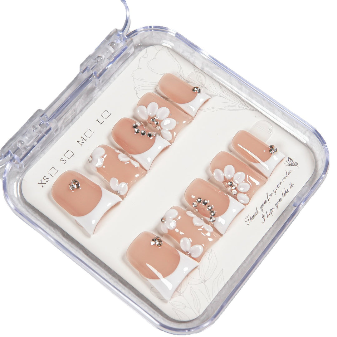 Floral Press-On Nail Set mit Juwelenakzenten