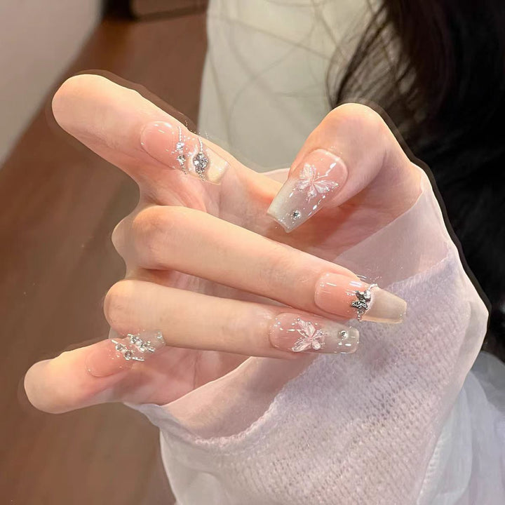 Dekoratives Press-On Nagelset mit elegantem Schmetterlingsdesign Karnz