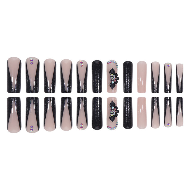Glamouröse Lange Stiletto Press-On Nägel mit Glitzer und Blütenakzenten Karnz