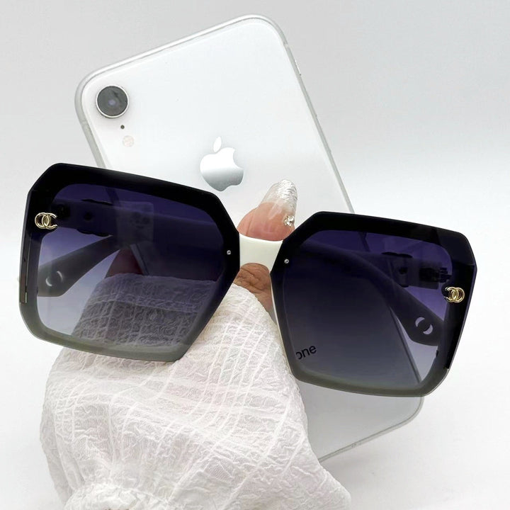 Damen Modische Sonnenbrille mit markantem eckigen Rahmen und luxuriösen Akzenten Karnz
