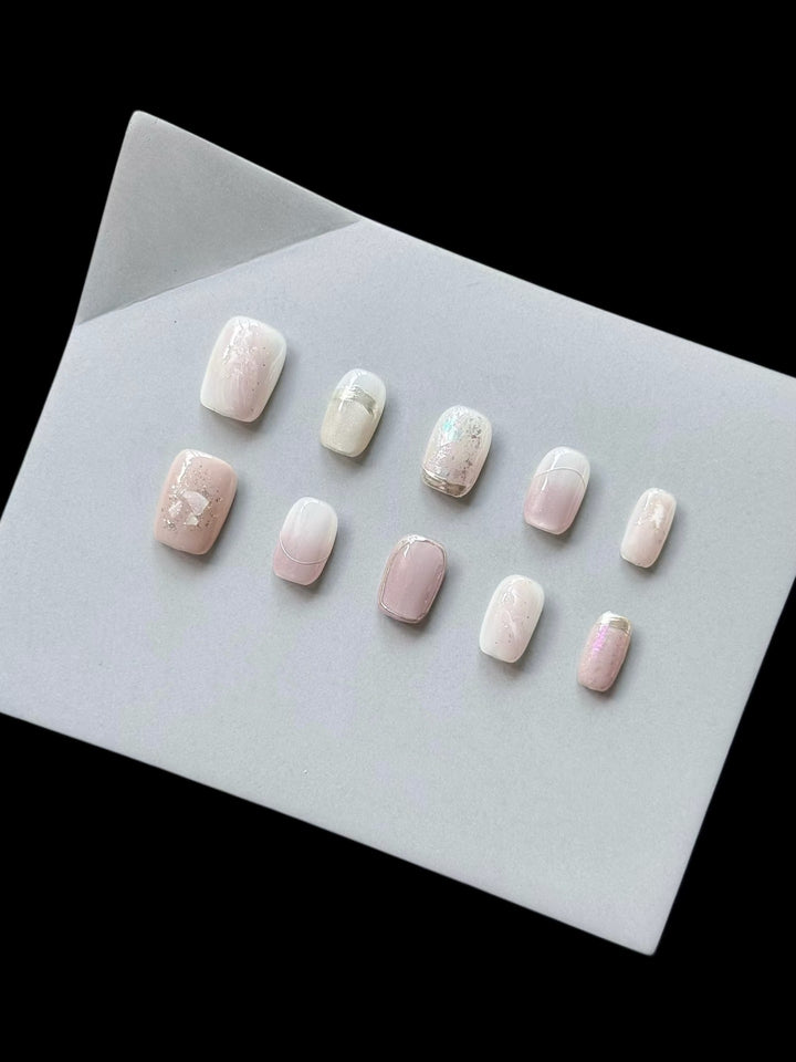 Press-On Nagelkunst Set mit elegantem Marmor- und Glitzerakzenten