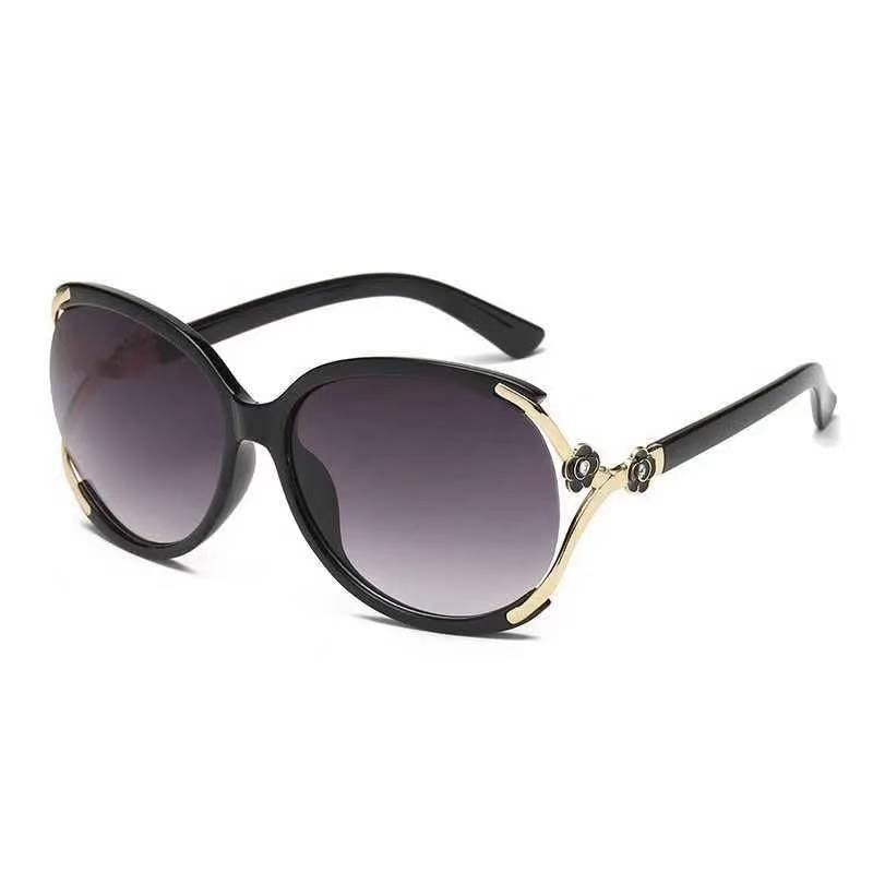 Damen elegante oversized Sonnenbrille mit goldenen Akzenten Karnz
