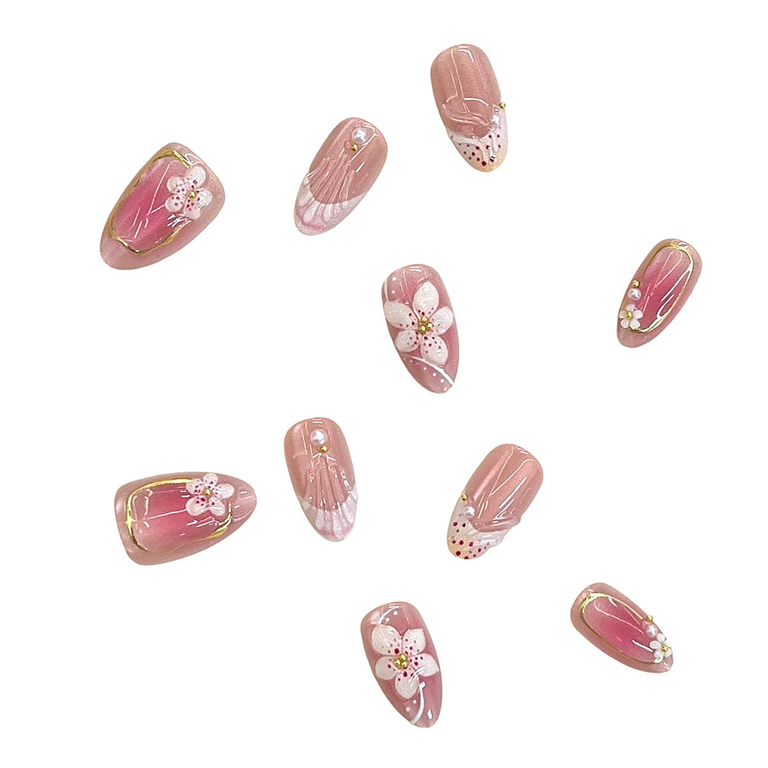Detailliertes florales Design Press-On Nagelset Karnz