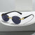 Damen modische Sonnenbrille mit transparentem Rahmen und flexibler Nasenauflage Karnz