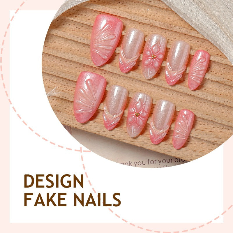 Kunstnagelset mit filigranen Blüten und Glitzerakzenten Karnz