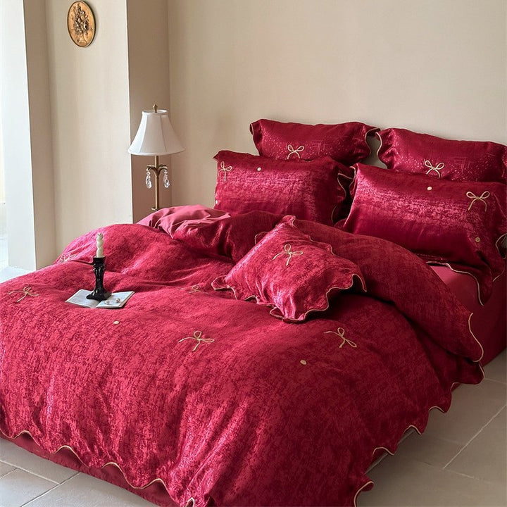 Luxuriöses Satin-Bettwäsche-Set mit Schleifenstickerei und Paspelierung Karnz