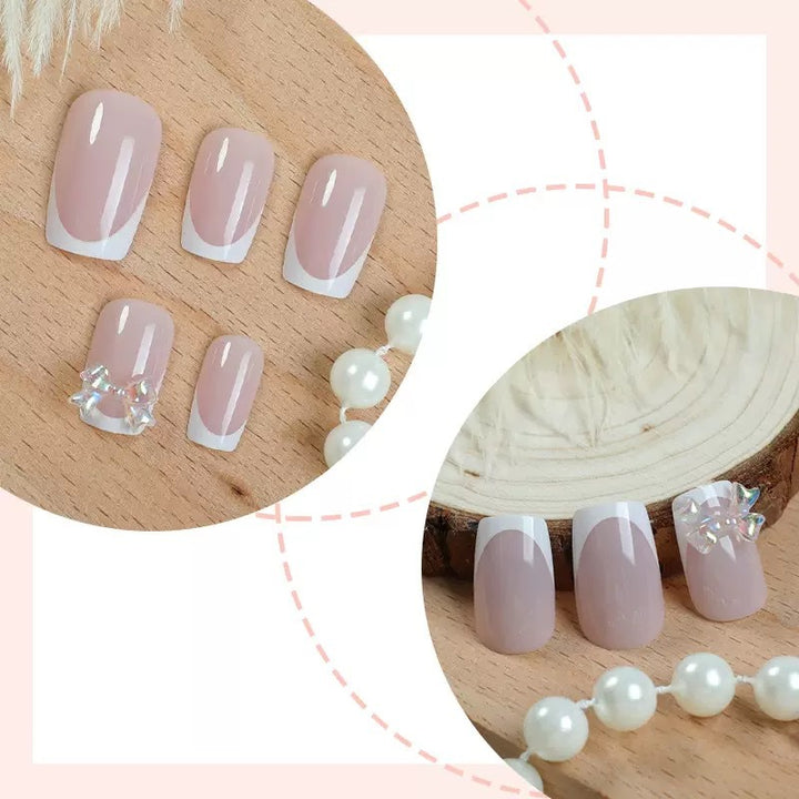 Kunstnagelset mit glamourösen French-Spitzen und funkelnden Akzenten Karnz