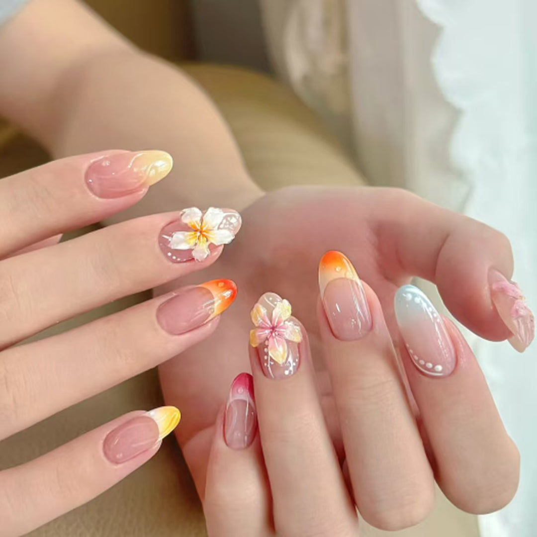 Künstlerisches Press-On-Nagelset mit floralen und Ombré-Designs Karnz