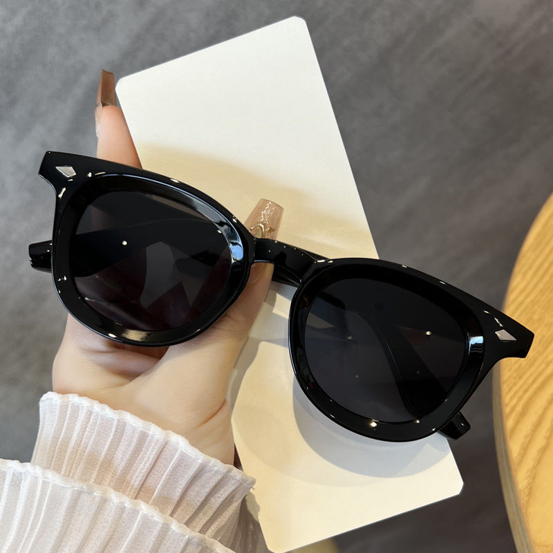 Damen modische Cat-Eye Sonnenbrille mit transparentem Rahmen Karnz