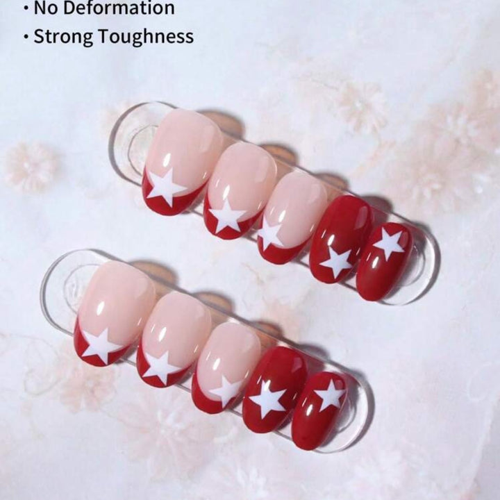 Kunstnagelset mit glamourösen Sternen-Design Karnz