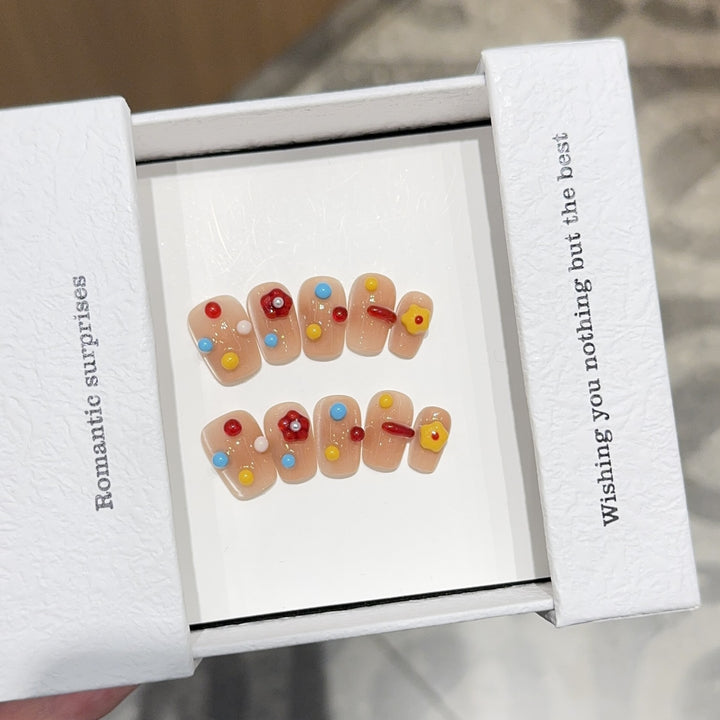 Kunstnägel mit Bunten 3D-Akzenten Karnz