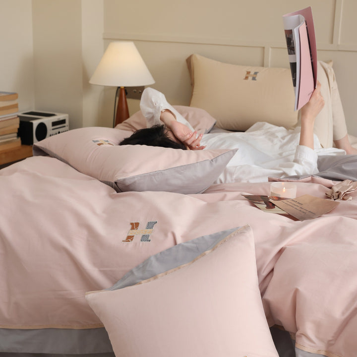 Zweifarbiges Luxus-Baumwoll-Percale-Bettwäsche-Set mit wendbarem Finish und besticktem Monogramm