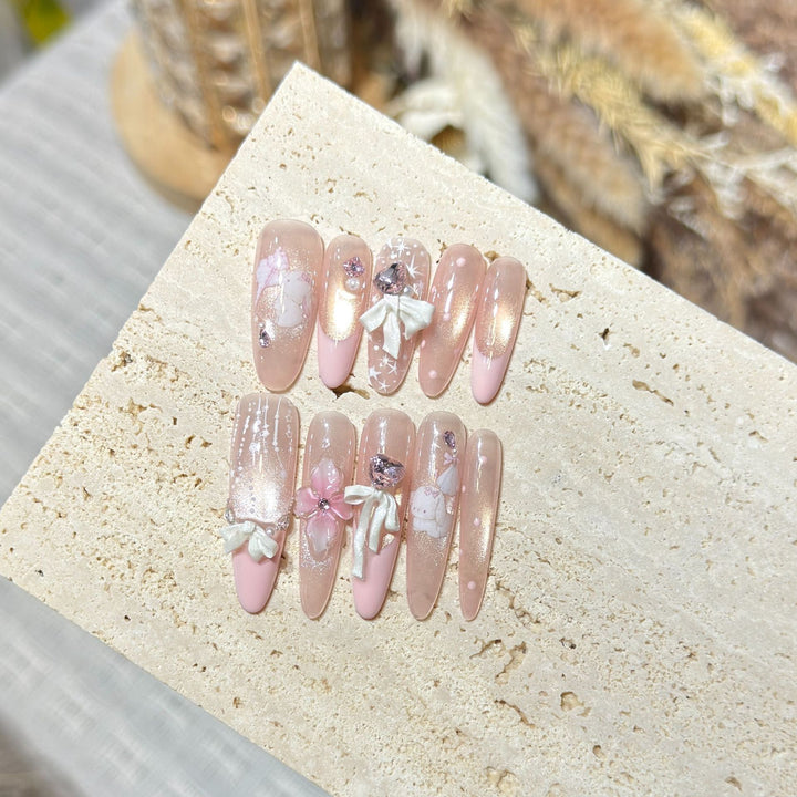Dekoratives Stiletto Press-On Nagelkunst-Set mit elegantem Blumenmuster Karnz
