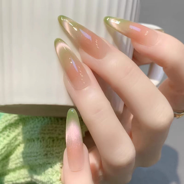 Künstlerisches Langes Stiletto Press-On Nagelset mit Schleife und Edelsteinakzenten Karnz