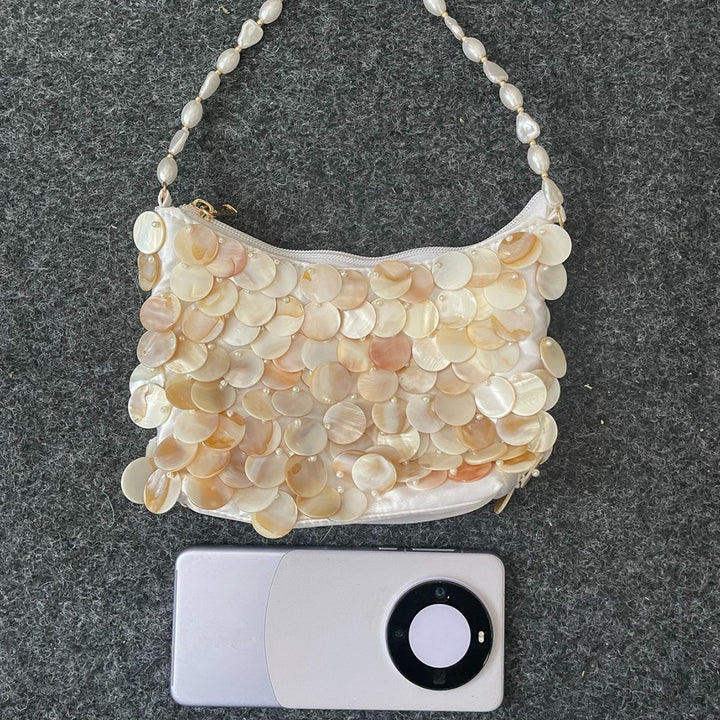 Einzigartige mit Muscheln verzierte Abendtasche