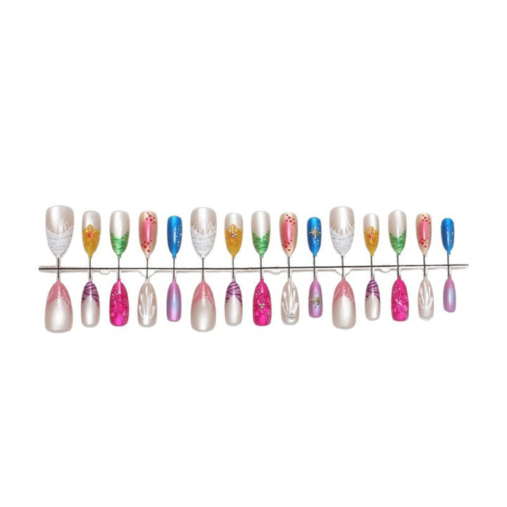 Kunstnagel-Set mit floralen und glitzernden Akzenten Karnz