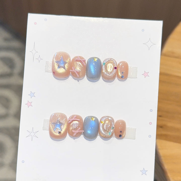 Kunstnagelset mit Funkelnden Sternen- und Glitzermotiven Karnz
