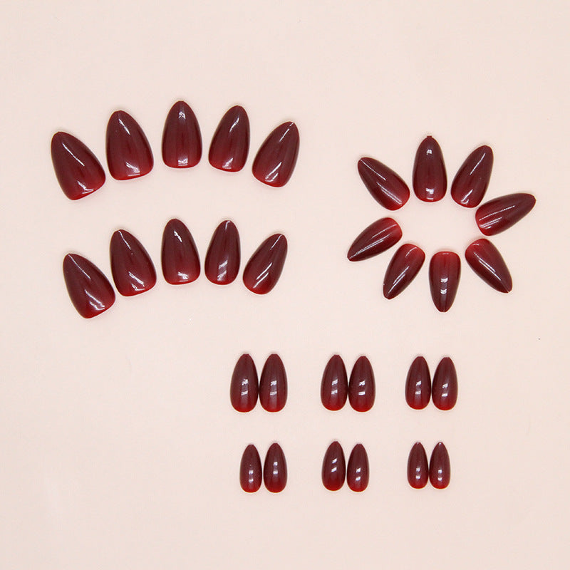 Elegante glänzende Mandel Press-On Nagelspitzen Karnz