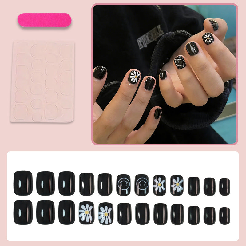 Kunstnagelset mit kreativen Blumen- und Uhrenmotiven Karnz