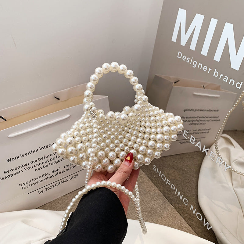 Elegante Handtasche mit Perlendetails