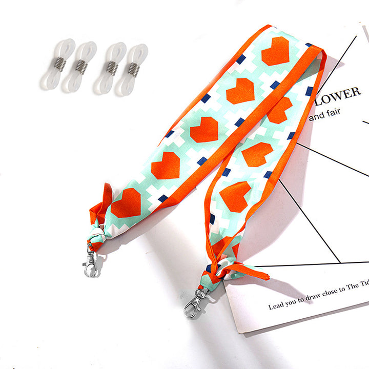 Modischer Stoffmaskenhalter mit Floralen Motiven Karnz