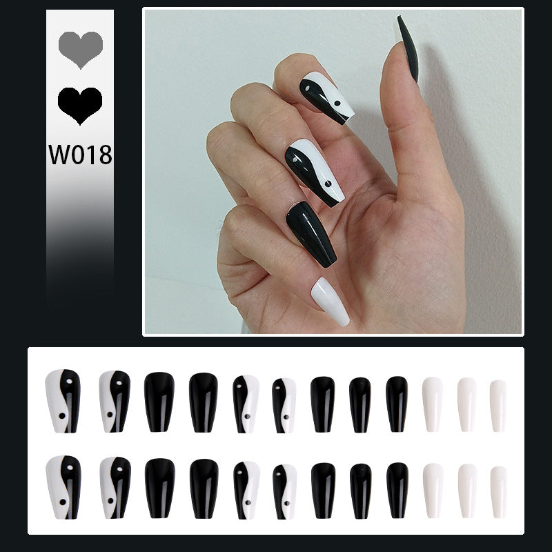Kunstnägel mit Yin-Yang Design Karnz