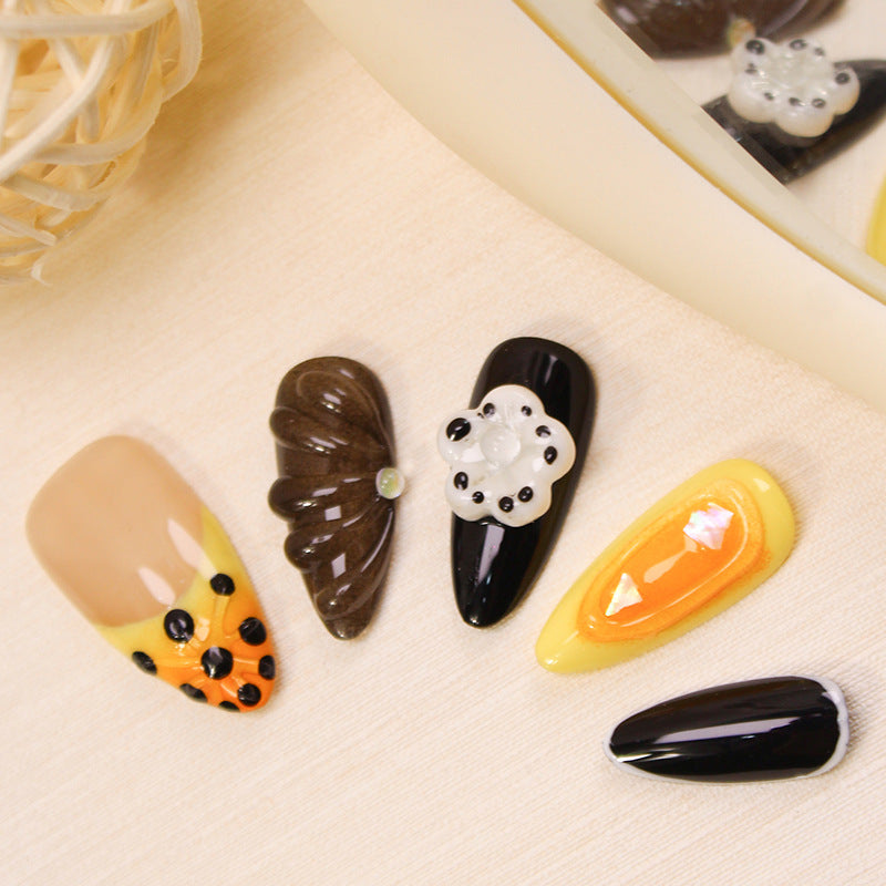 Kunstnagelset mit kreativen Dessert-Motiven Karnz