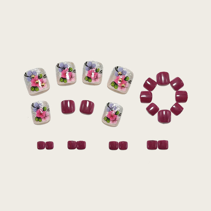 Kunstnägel mit Floralen Designs und Glitzereffekten Karnz