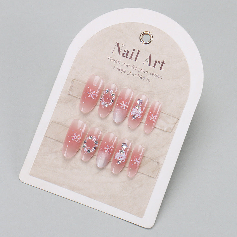 Elegantes Press-On-Nageldesign mit Strassakzenten Karnz