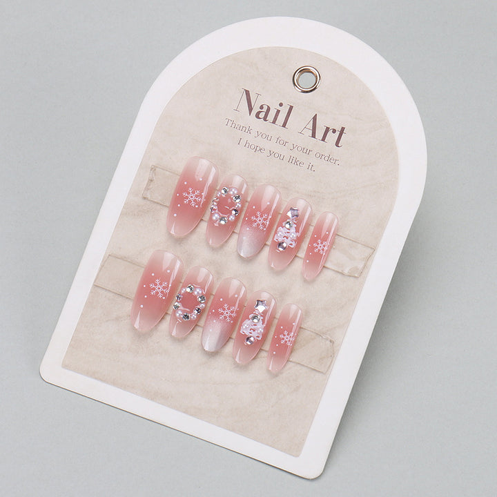 Elegantes Press-On-Nageldesign mit Strassakzenten Karnz