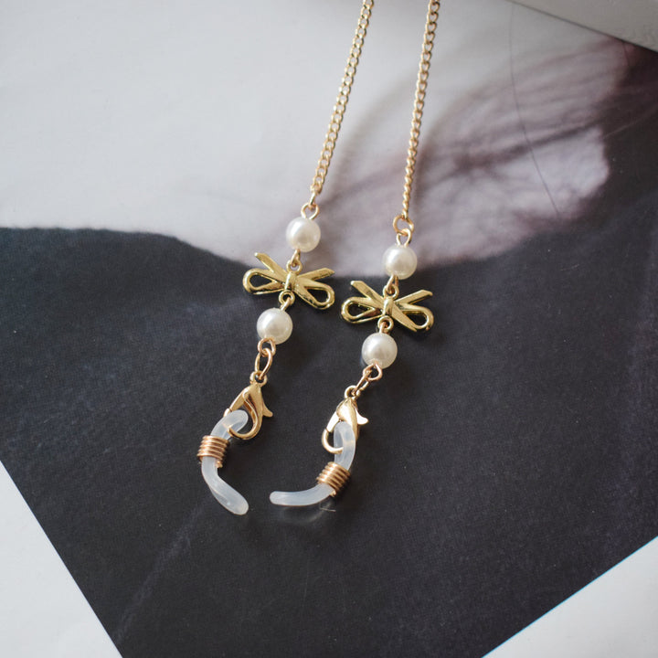 Elegante mit Perlen akzentuierte Brillenketten Karnz 1786692339