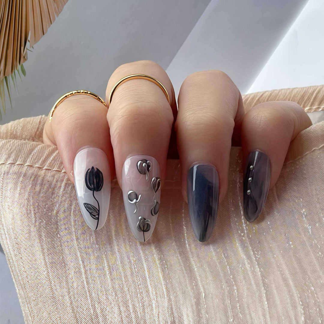 Künstlerisches Stiletto Presse-auf-Nageldesign mit zeitgenössischen Akzenten Karnz
