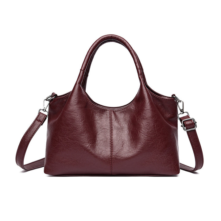 Elegante multifunktionale Handtasche Karnz