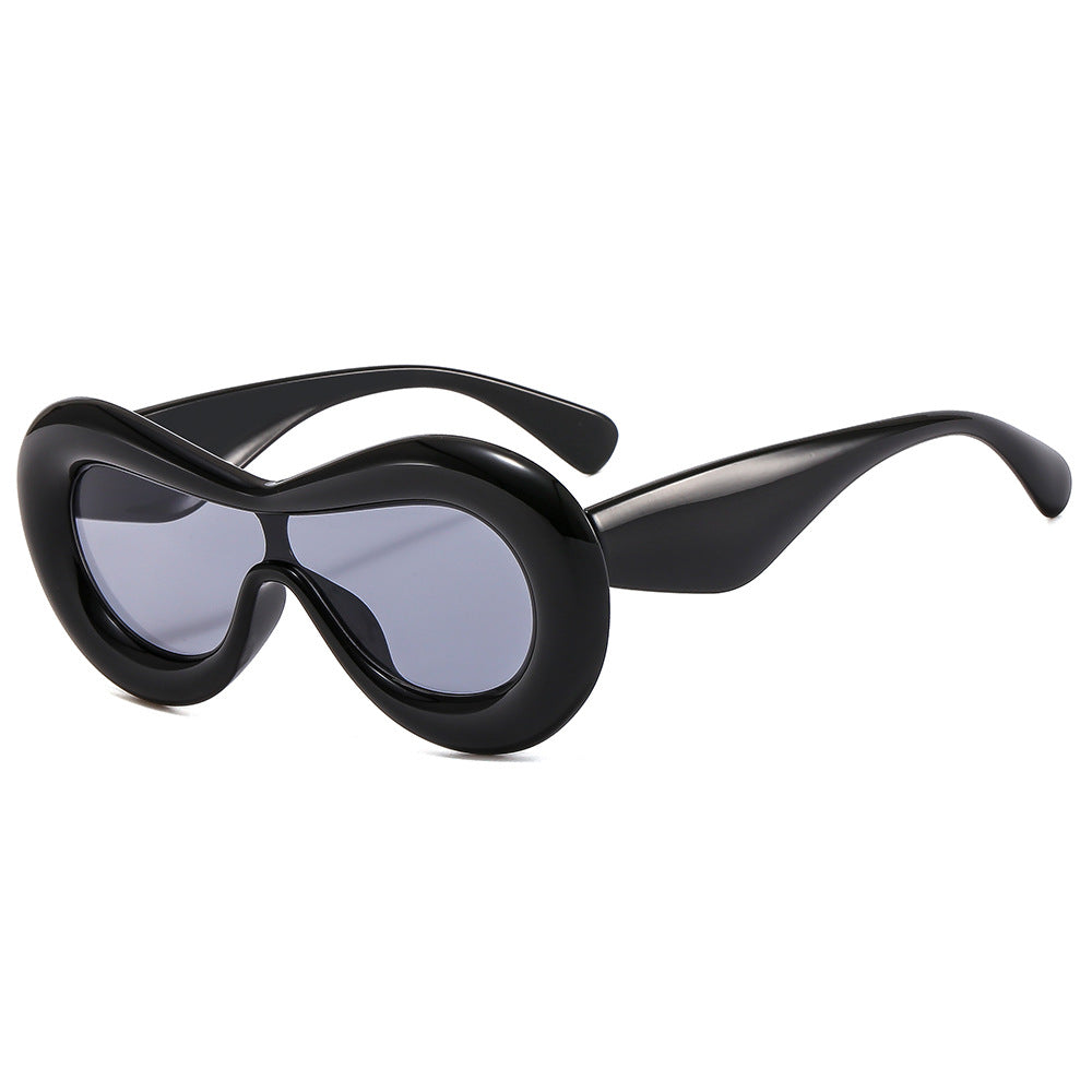 Damen modische Sonnenbrille mit nostalgischem Schwung Karnz