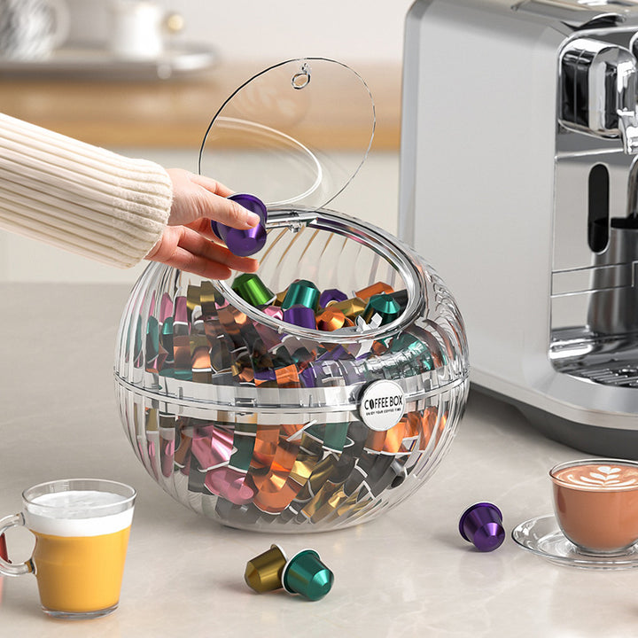Kugelförmiger Kaffeekapselspender aus klarem Acryl mit Klappdeckel
