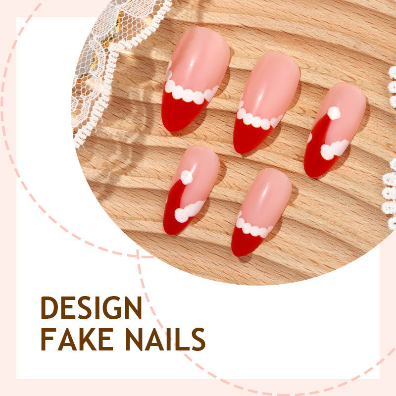 Kunstnagelset mit festlichen Santa-Motiv und Glitzerakzenten Karnz